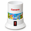 Camera electric baby bottle warmer front view on white background